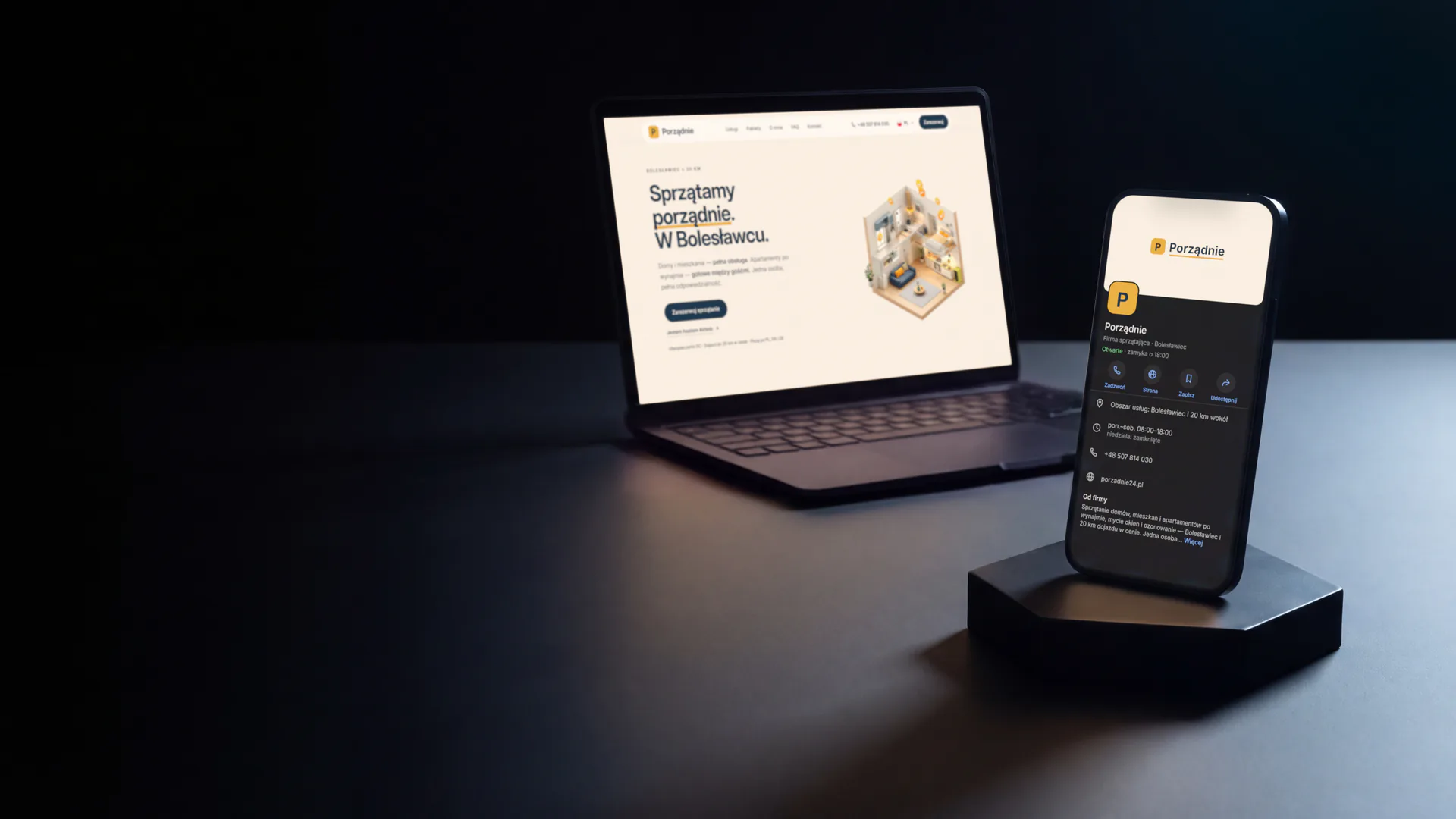 Telefon z wizytówką Google firmy Porządnie i laptop ze stroną porzadnie24.pl na ciemnym blacie